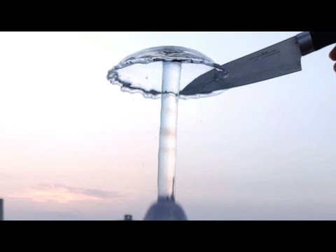 Slow motion of popping a water balloon || Looks amazing