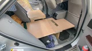 Car Camping in a 2012 Toyota Camry.  Bed, Toilet and power ventilation system build.