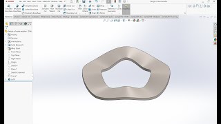 Download the video "SolidWorks Tutorial: How to Design a Wave Washer Using Curve Through Reference Points"