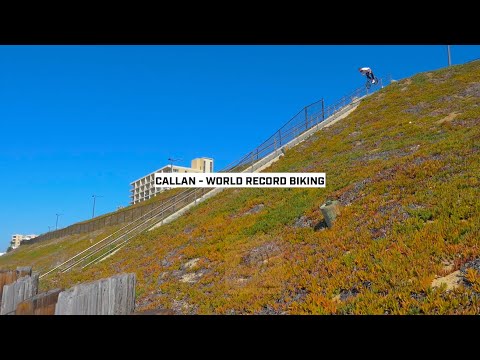 Callan Stibbards doing BMX stunts on a 70 plus stair rail
