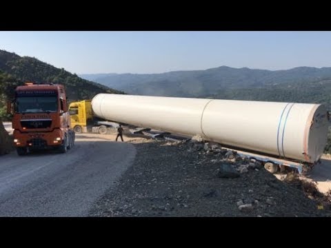 Huge Part Of A Wind Turbine Transporting By 2 Man Trucks - Poultidis SA
