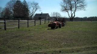 Slinging composted horse manure at Linger Longer.