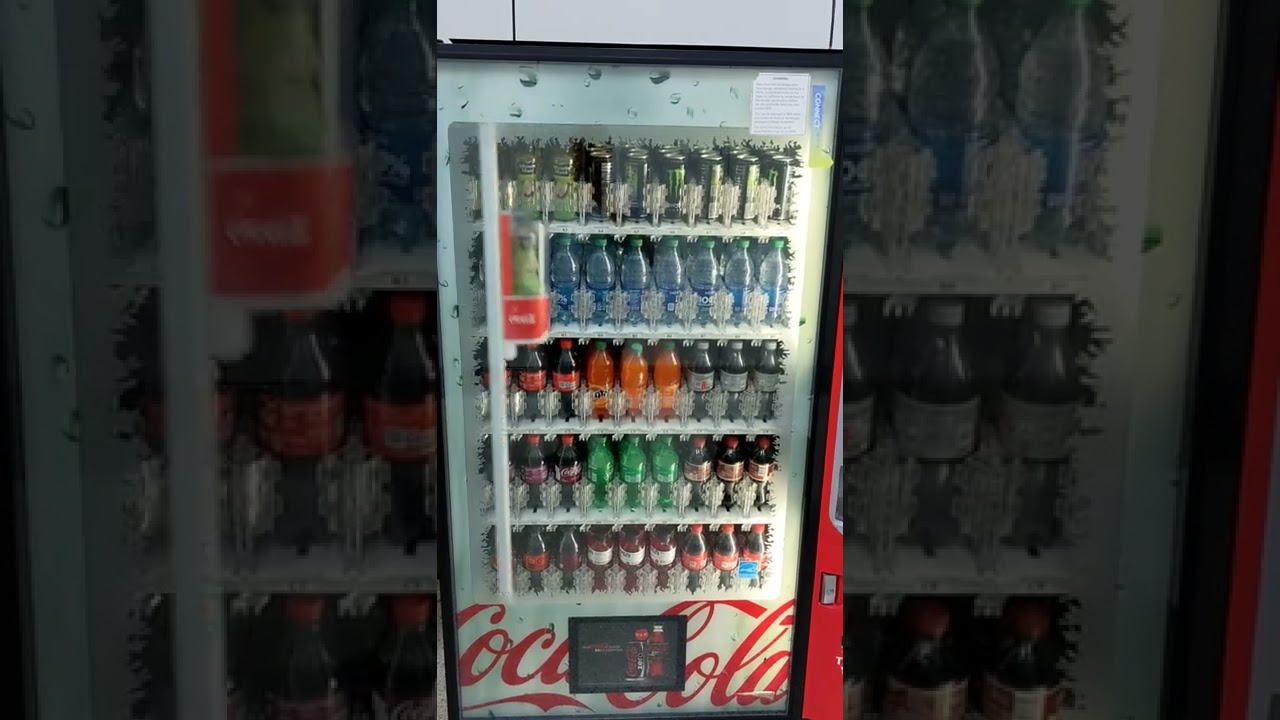 Dixie Narco Bevmax  Soda Vending Machine with Robotic Arm - Sacramento CA