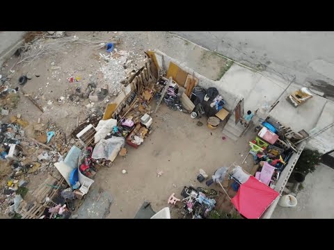 JUAREZ MEXICO MAN AND DOGS RUN FROM DRONE IN CARTEL AREA