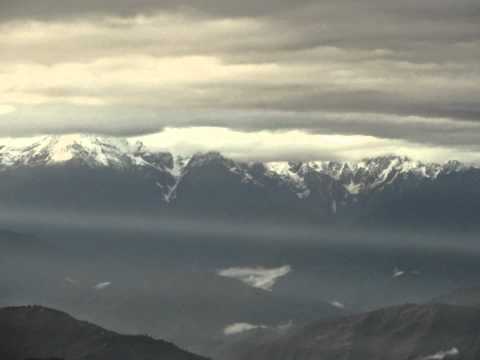 The Picks Of The Mount Kanchanjunga Range Was Covered By White Cloud.