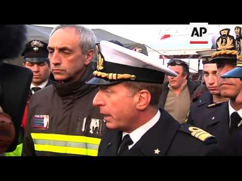 Five more bodies found on ship, coast guard, divers