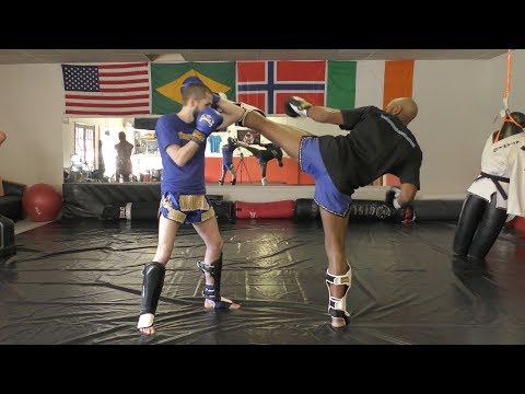 Setup a Lead Hook Kick with a Leg Kick | TKD Kickboxing Combos