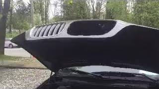 How to open the hood from outside on BMW X5