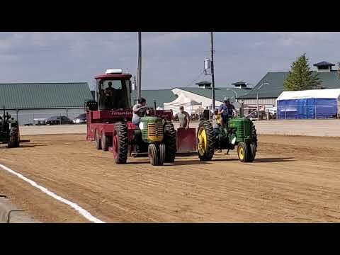 Pulling 1949 Oliver 66 and 1943 john deere b at xenia old timers show