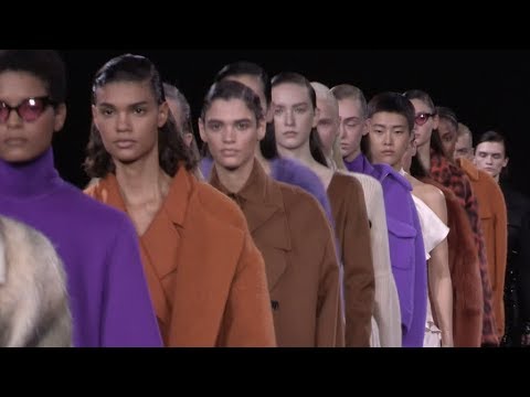 Models and designer on the runway for the Rochas Fashion Show in Paris