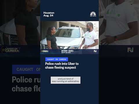 Police rush into Uber to chase fleeing suspect