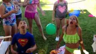 preview picture of video 'Brother vs. Sister Donut on a string eating contest'