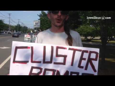 Garret Kirkland of Lowell joins others protesting cluster bombs outside Textron in #WilmingtonMA. @L