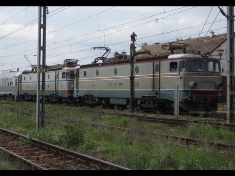 Romania: Two CFR Class 40 & 41 electric locos depart from Deda on Targu Mures to Galati train