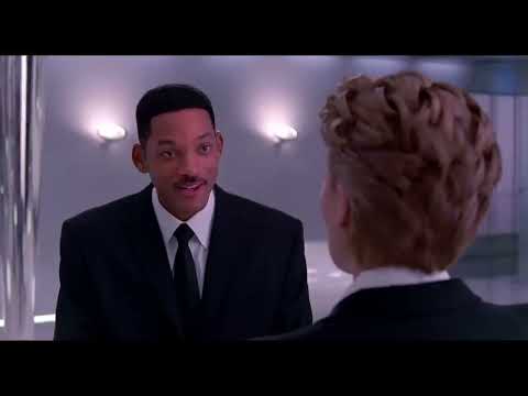 Men in Black 3 trailer frame with Agents J and K facing an alien threat