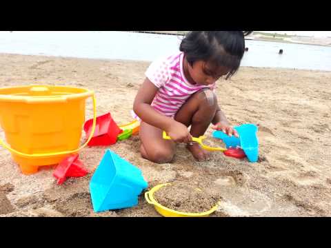 Hanika and Havish playing at the Beach