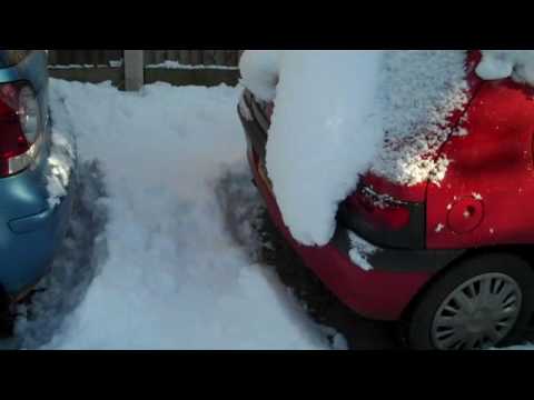 cars snowed in at camberley