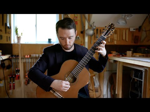 Watch Colin Davin perform the "Gigue" from J.S. Bach's "Sixth Cello Suite" on a double top guitar by Joshia de Jonge.