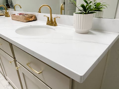 Part of a video titled DIY Faux Marble Countertop - Vein Tutorial - YouTube