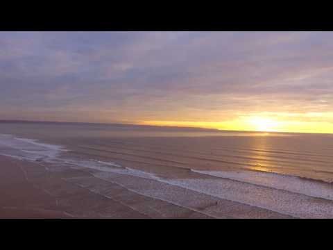 Drone footage of surfers and waves at Saunton Sands