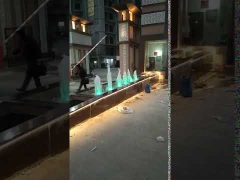 Orange and grey plastic pool lifebuoy, round