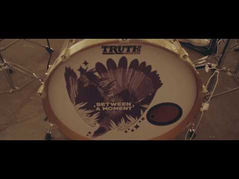 Between A Moment - Torn Pictures (Official Music Video)