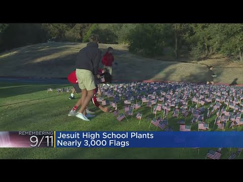 Jesuit High Students Place Flags On School Lawn On 9/11