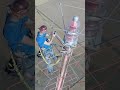 Changing a light bulb for $50,000 at insane height #jobs #heightchallenge