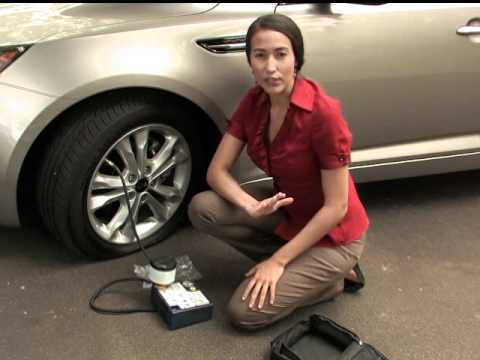 Part of a video titled Kia Tire Mobility Kit - YouTube