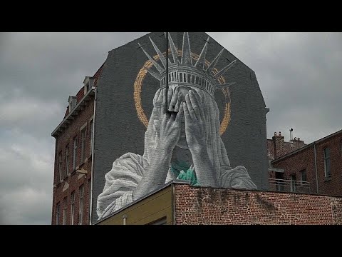 Giant mural in France critiques Trump's immigration policies