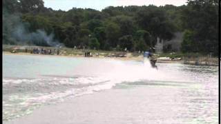 preview picture of video 'Grand Marais, Michigan - Snow Sleds On The Bay. 4th Of July 2011'