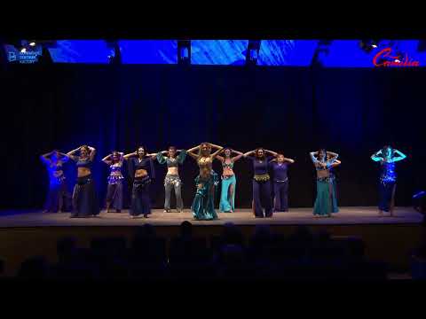 Camilia and students belly dancing to "Cobra" by Denorecords