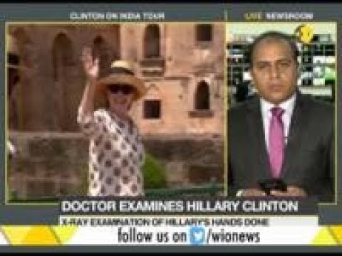 Doctor examines Hillary Clinton, X ray also being done