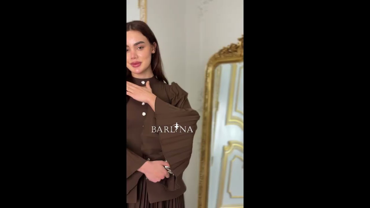 A stylish brown dress with an elegant cut - XL