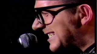 Elvis Costello/ Let Him Dangle.
