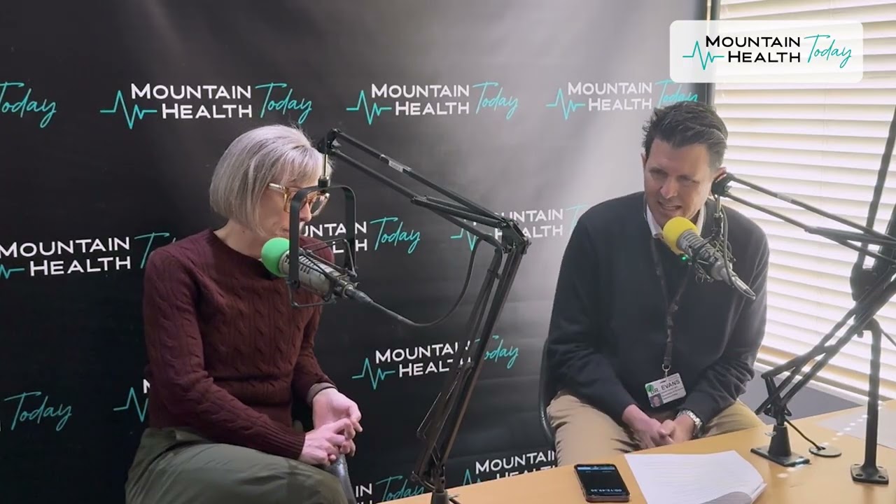 Dr. Brian Evans and Dr. Ellen Cooper speaking into microphones in the Mountain Health Today podcast studio