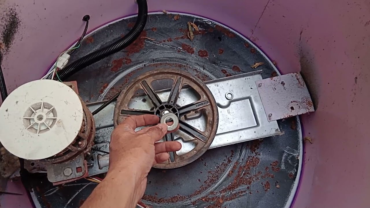 CAMBIO DE TRASMISION LAVADORA ACROS DE TINA CAMBIO DE EMPAQUES ,BALERO,EMPAQUES Y MANGUERA DESAGUE .