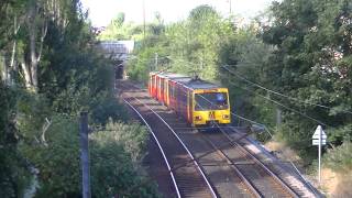 preview picture of video 'Tyne and Wear Metro-Metrocars 4056 and 4071 passing Bridge 1126 (Shiremoor)'