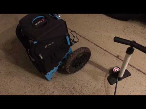 Part of a video titled How to inflate Zuca disc golf cart tires! - YouTube