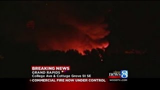 Fire rages at GR auto salvage building