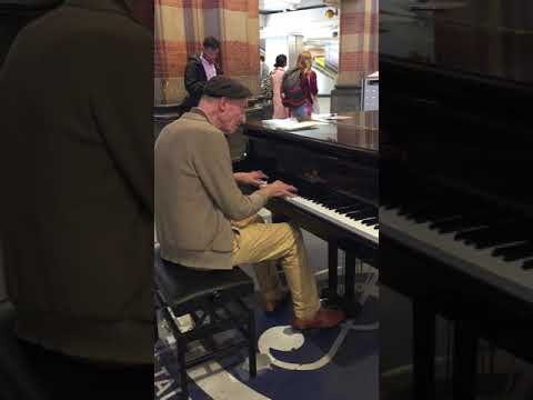 Jazz pianist at Amsterdam Central Station