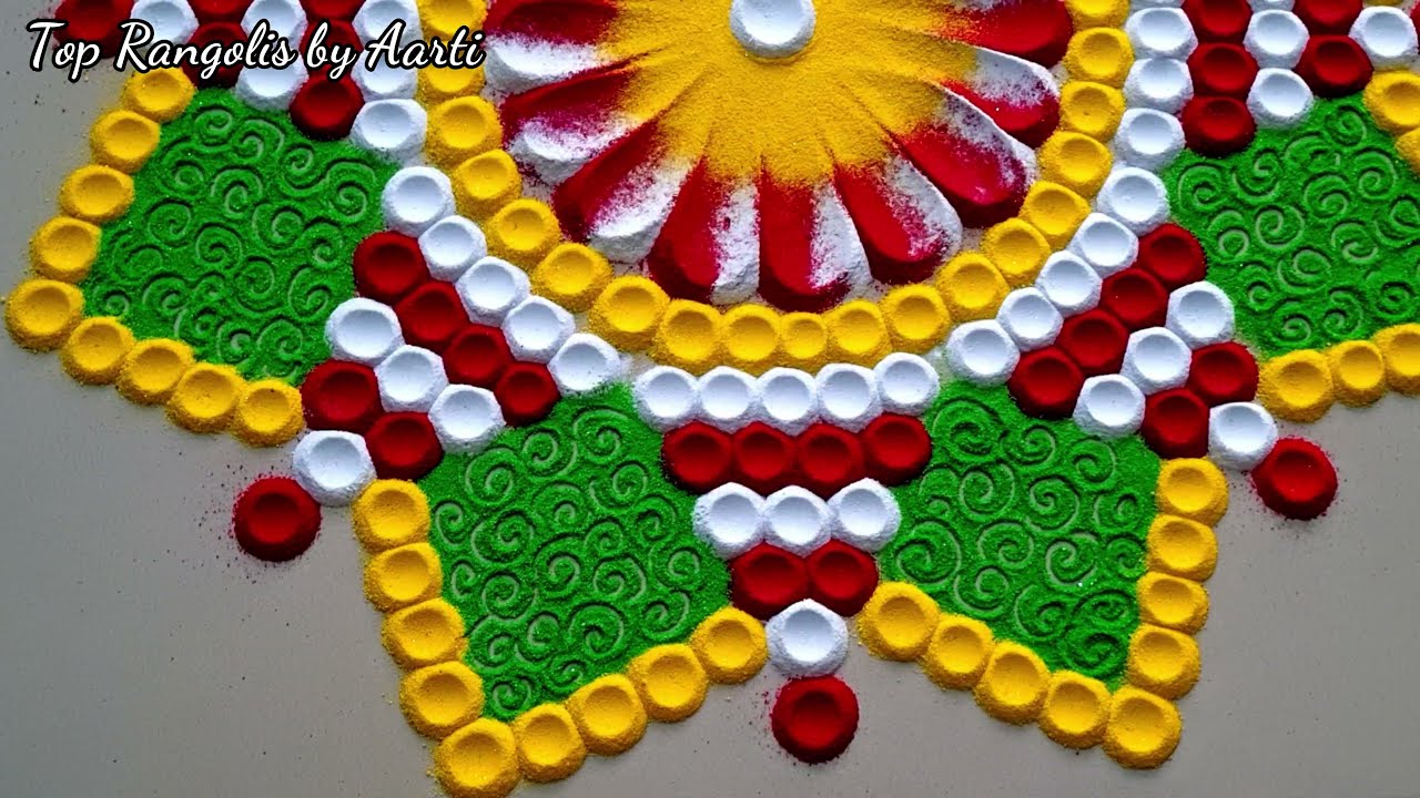  simple rangoli design with spoon by aarti