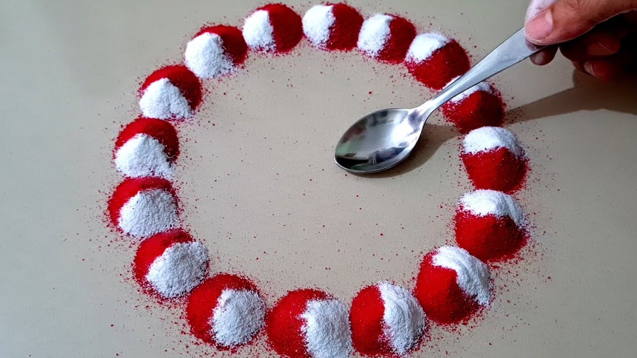  simple rangoli design with spoon by aarti