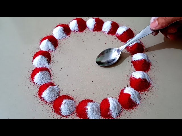 simple rangoli design with spoon by aarti