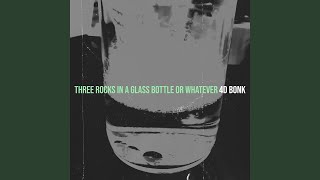 Three Rocks in a Glass Bottle or Whatever