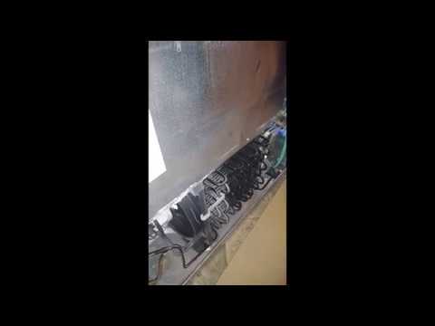 Why are the walls in my refrigerator to hot to touch?