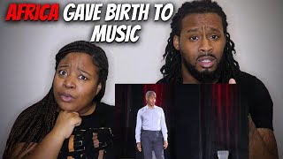 American Couple Reacts "How Banning The African Drum Gave Birth to American Music - Chris Johnson"
