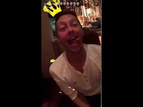 Chris Martin playing with snapchat