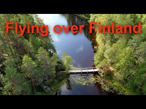 Flight over Finland Forest and Lakes