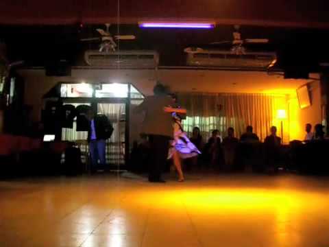  Federico Naveira  and  Inés Muzzopappa  are  dancing  to  a  vals
